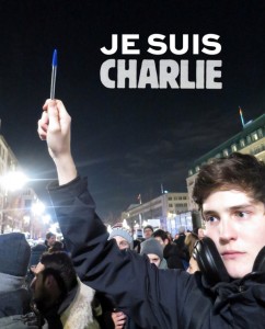 Für die Freiheit: Mika, Zeichner aus Paris, am 7. Januar vor der Französischen Botschaft in Berlin. Foto: Günter Bartsch